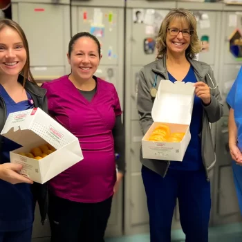Some of our staff enjoying some donuts!